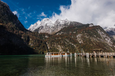 Scenic view of lake königssee and mountains against sky