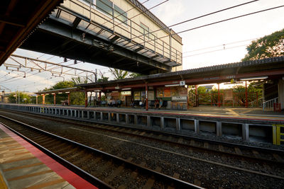 Railroad station platform against sky