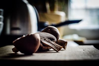 Close-up of halved mushroom on table