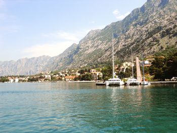 Scenic view of lake with mountains in background