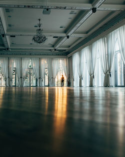 People in illuminated building