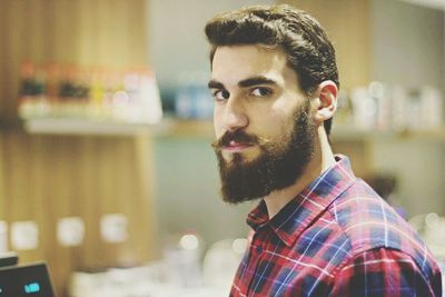 Portrait of young man looking away