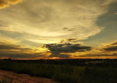 Scenic view of dramatic sky during sunset
