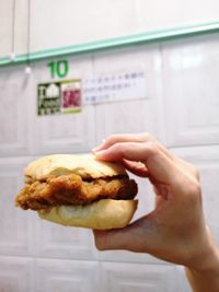 Midsection of person holding ice cream
