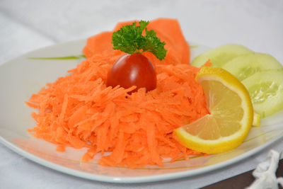 High angle view of orange slices in plate on table