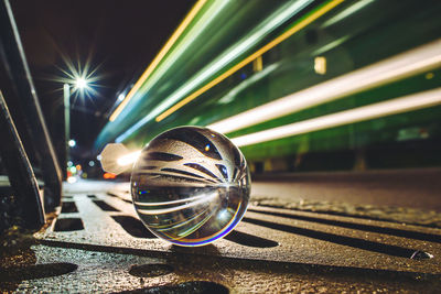 Close-up of reflection on marble at night