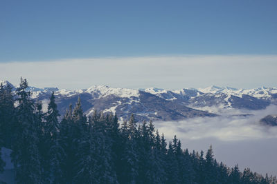 Scenic view of snowcapped mountains against sky