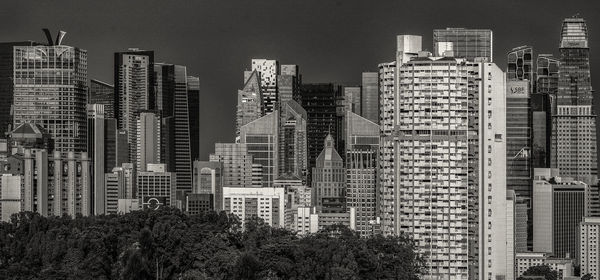 High angle view of modern buildings against sky