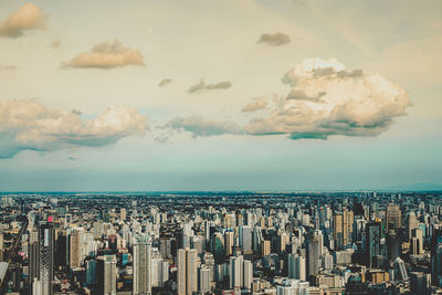 High angle view of modern buildings against sky