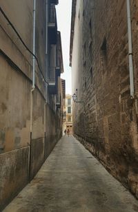 Narrow walkway in city