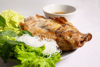 High angle view of bread in plate on table