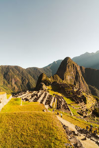 Machu picchu old inca ruins at sunrise in peru