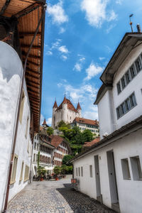 Buildings in city against sky