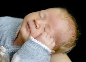 Close-up of newborn child sleeping