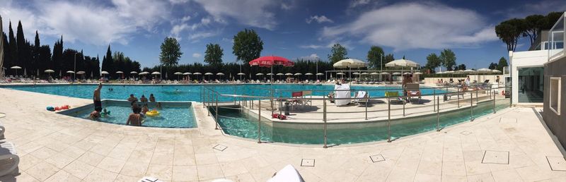 Panoramic view of swimming pool against sky