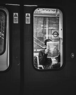 Man sitting in train