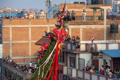 Devotees pull chariots as they take part in the festivities to mark the rato machindranath chariot.