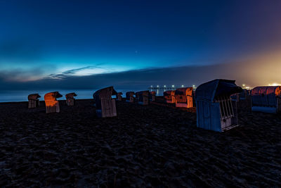 Panoramic view of beach against sky during sunset