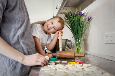 Portrait of cute girl smiling at home