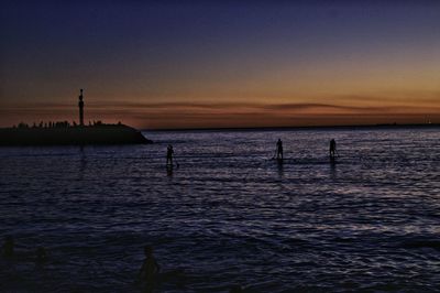 Scenic view of sea at sunset