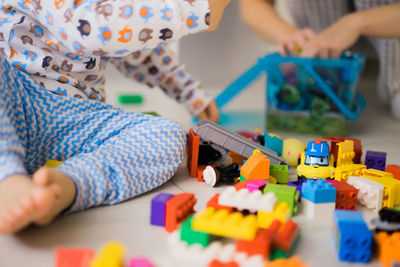 Boy playing with toy on table