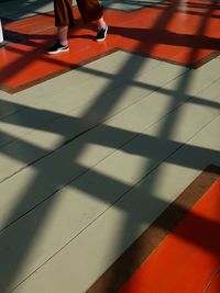 Low section of people on tiled floor