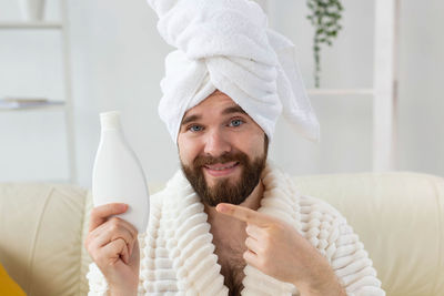 Portrait of smiling man at home