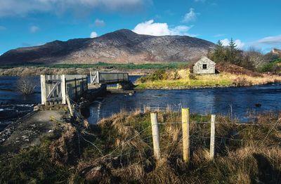 Dramatic landscape scenery, trail, river and mountains, derryclare, connemara, ireland