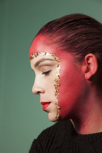 Portrait of young woman looking away