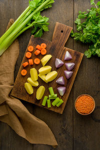 High angle view of chopped vegetables on cutting board