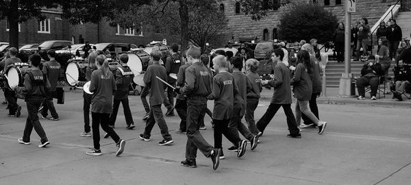 People walking on street in city