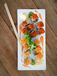 High angle view of sushi served on table