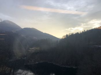 Scenic view of mountains against sky during sunset