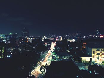 Illuminated cityscape at night