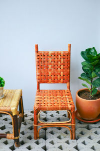 Empty chairs against white background