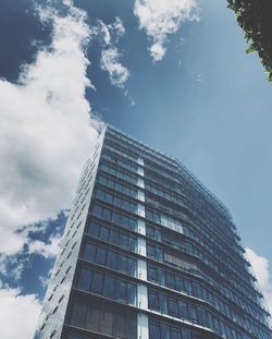 Low angle view of modern building against sky in city