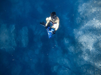 Man swimming in sea