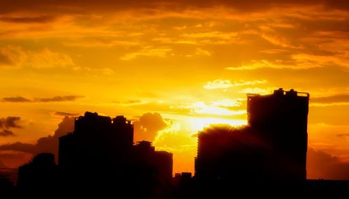 Silhouette of buildings at sunset