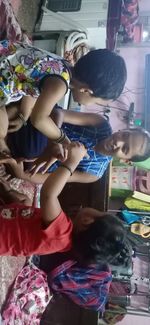 Rear view of people in traditional clothing