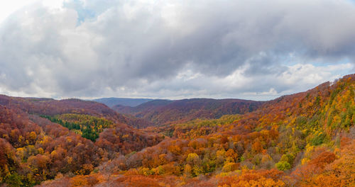 Scenic view of mountains against sky during autumn