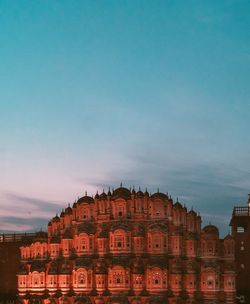 High angle view of building against sky at sunset