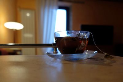 Close-up of tea in glass on table