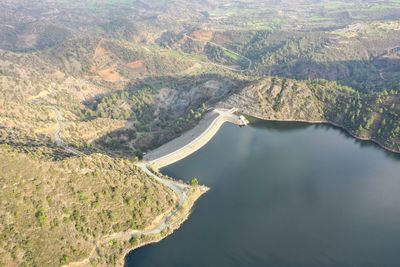 High angle view of dam lake  amidst land lefkara 