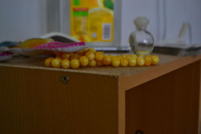 Close-up of fruits on table at home