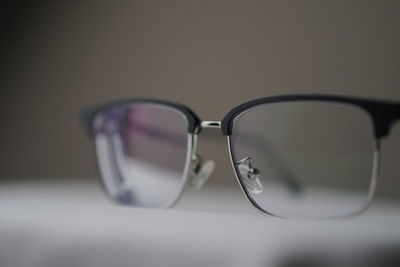 Close-up of sunglasses on table