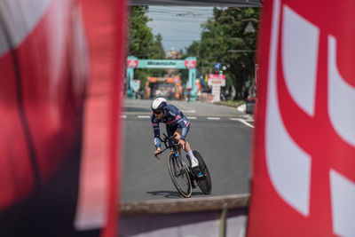 Man riding bicycle on city