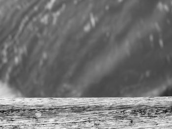 Close-up of wood against sea