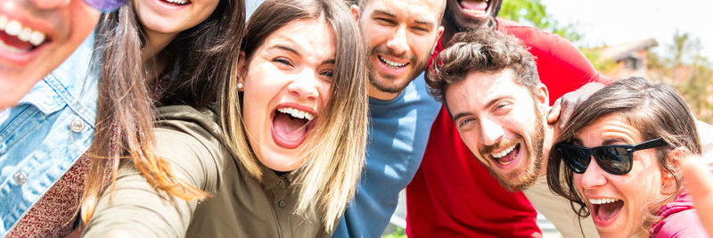 Group happy multiracial friends taking selfie with mobile phone horizontal web banner for header 