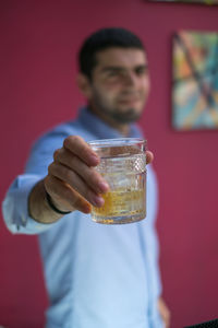 Young woman drinking glass