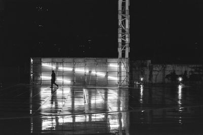 Reflection of illuminated buildings in water at night